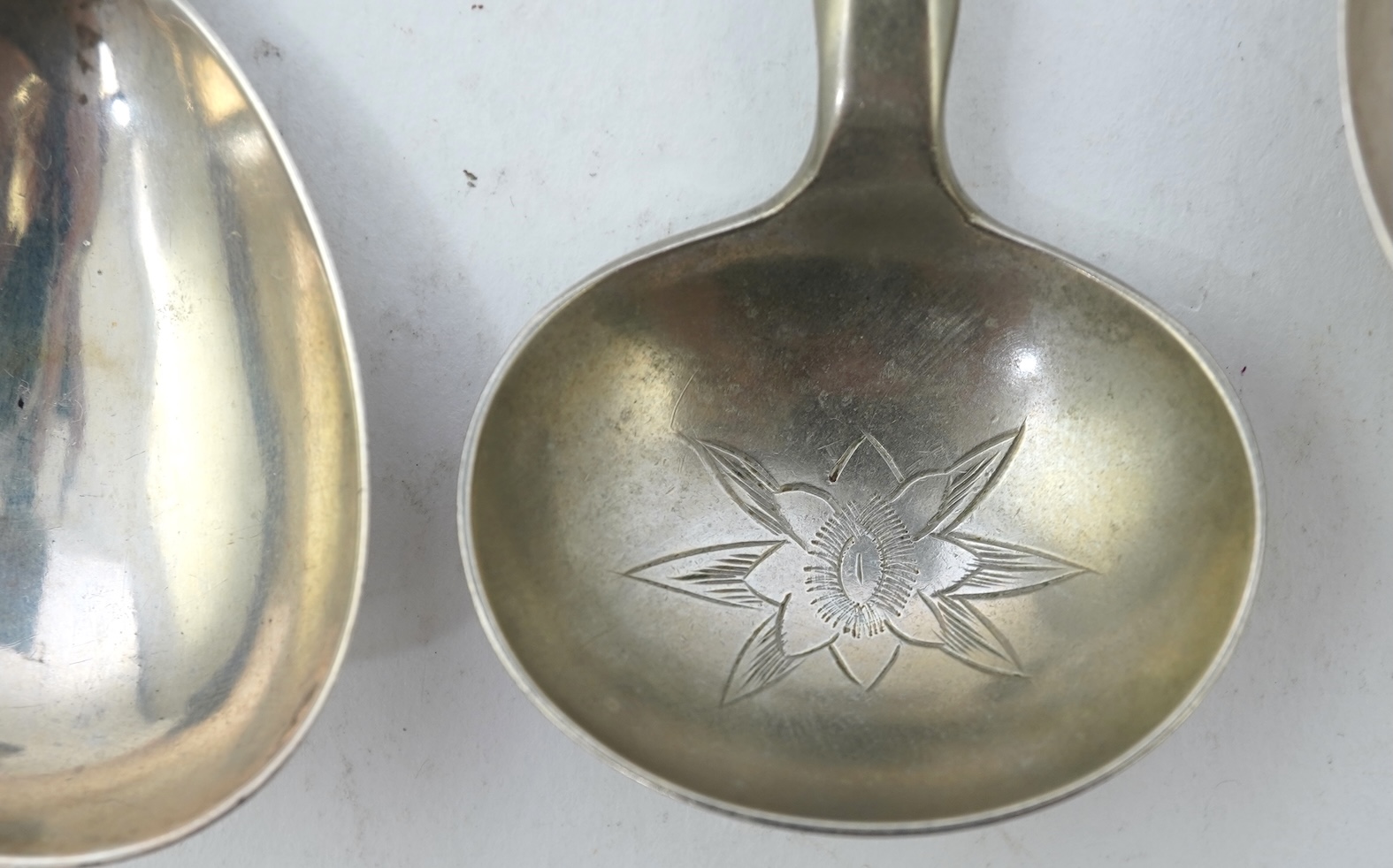 Nine assorted 19th century and later silver and white metal caddy spoons